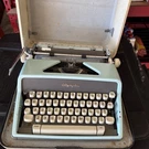 Olympia Deluxe SM7 Portable Typewriter W/case Blue Very Good Condition. Fixed Price $332.50.