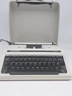 Silver Reed SR12 Typewriter Small With Case. Fixed Price $129.99.