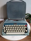 Vintage Brother Opus 888 Blue Portable Typewriter Case Original Paperwork. Fixed Price $140.00.