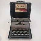 Vintage 1948 Royal Portable Quiet De Luxe Gray Typewriter Black Case User Manual. Fixed Price $99.00.