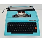 Vintage *pristine* 1970'S Omega 300 Portable Spanish Typewriter & Case. Fixed Price $225.00.