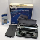 Sharp PA-3100 Ii Portable Electronic Intelliwriter Plus Ob Manual Tested & Works. Fixed Price $50.00.