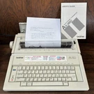 Brother AX-350 Portable Electronic Typewriter W/ Manual & Cover Tested Works. Fixed Price $50.00.