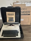 Nadex Pioneer Manual Typewriter, Durable Travel Case Included, White. Fixed Price $140.00.