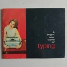 World Of Typing Smith-corona Manual Cute Girl The Cover Hugging Typewriter. Fixed Price $24.75.