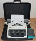 Olympia SM9 Portable Manual Typewriter In Case. Fixed Price $260.00.