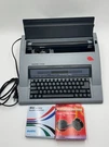 Swintec 2416 Dm Grey Cabinet Electronic Typewriter W/ Replacement Ribbons. Fixed Price $249.00.