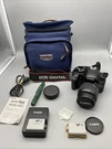 Canon Eos Rebel Xsi Zoom Lens Ef-s 15-55MM Guide Strap Case 2 Battery Charger. Fixed Price $149.99.
