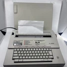 Smith Corona XL-1500 Portable Electric Typewriter W/ Cover & New Ribbon Works. Fixed Price $48.59.