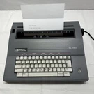Smith Corona Model 5A SL460 Electric Typewriter W/ Cover And Tested & Working. Fixed Price $83.40.