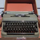 Olympia SM3 Deluxe Portable Typewriter W/ Carrying Case Made West Germany!. Fixed Price $200.00.