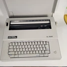 Smith Corona Xl 1000 Electric Typewriter Model 5A With Cover Vintage. Fixed Price $49.97.