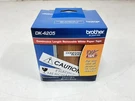 Brother DK-4205 Removable Continuous Paper Labels 2.4" X 100'. Fixed Price $20.00.