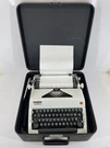 Vintage 1971 SM9 Olympia De Luxe Portable Manual Typewriter With Case Works. Fixed Price $359.99.