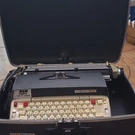 Smith Corona Electra 120 Electric Portable Vintage Typewriter With Case. Fixed Price $89.99.