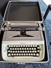 Professional Model T-62 Portable Typewriter With Carrying Case. Fixed Price $125.00.