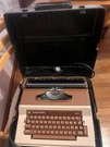 Silver Reed 8610 Typewriter With Sovereign Electra Hard Case. Fixed Price $55.00.