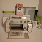 Cricut Personal Cutter CRV001 Bundle George Basic Shapes Mats Manual Tested. Fixed Price $49.99.