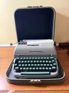 Vintage Remington Quiet-riter Portable Typewriter Case Blue Keys Decor. Fixed Price $74.99.