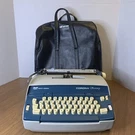 Smith-corona Seventy Electric Typewriter W/bag & Ribbon. Blue White Keys. Fixed Price $89.00.