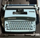Smith Corona Coronet Super 12 Electric Portable Typewriter W/ Case - Baby Blue. Fixed Price $99.99.