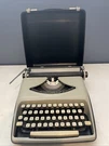 Vintage Remington Envoy Typewriter, Good Condition Beige W/ Black Case. Fixed Price $74.99.