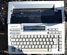Vtg Sharp Portable Intelliwriter PA-1000H No Cord Read Parts Only- Please. Fixed Price $39.00.