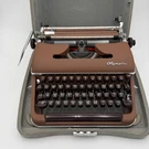 1950S Olympia SM3 De Luxe Typewriter West Germany W/ Case Ribbons Cover. Fixed Price $300.00.