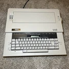 Smith Corona Xd 7000 Spell Right Ii Model 5L Electric Typewriter. Manual & Case. Fixed Price $80.00.