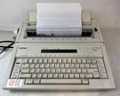 Brother AX-550 Word Processing Electric Portable Typewriter W/manual. Fixed Price $73.80.