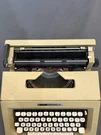 Vintage Olivetti Lettera 25 Portable Manual Typewriter W/ Original Bag Case. Fixed Price $165.00.