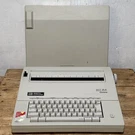 Smith Corona 250 Dle Electric Typewriter Model 5A With Cover Works Great. Fixed Price $89.00.