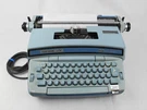 Smith-corona Super 12 Blue Electric Typewriter Model 6LEA. Fixed Price $79.00.
