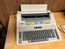 Vintage Canon ES23 Portable Electric Typewriter Fully Tested Works Has Ink. Fixed Price $85.00.