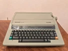 Sharp QL-820 Celebra Portable Elecronic Typewriter. Fixed Price $44.99.