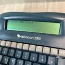Alphasmart 2000 Portable Keyboard Word Processor Only No Manual Cords Working. Fixed Price $49.00.
